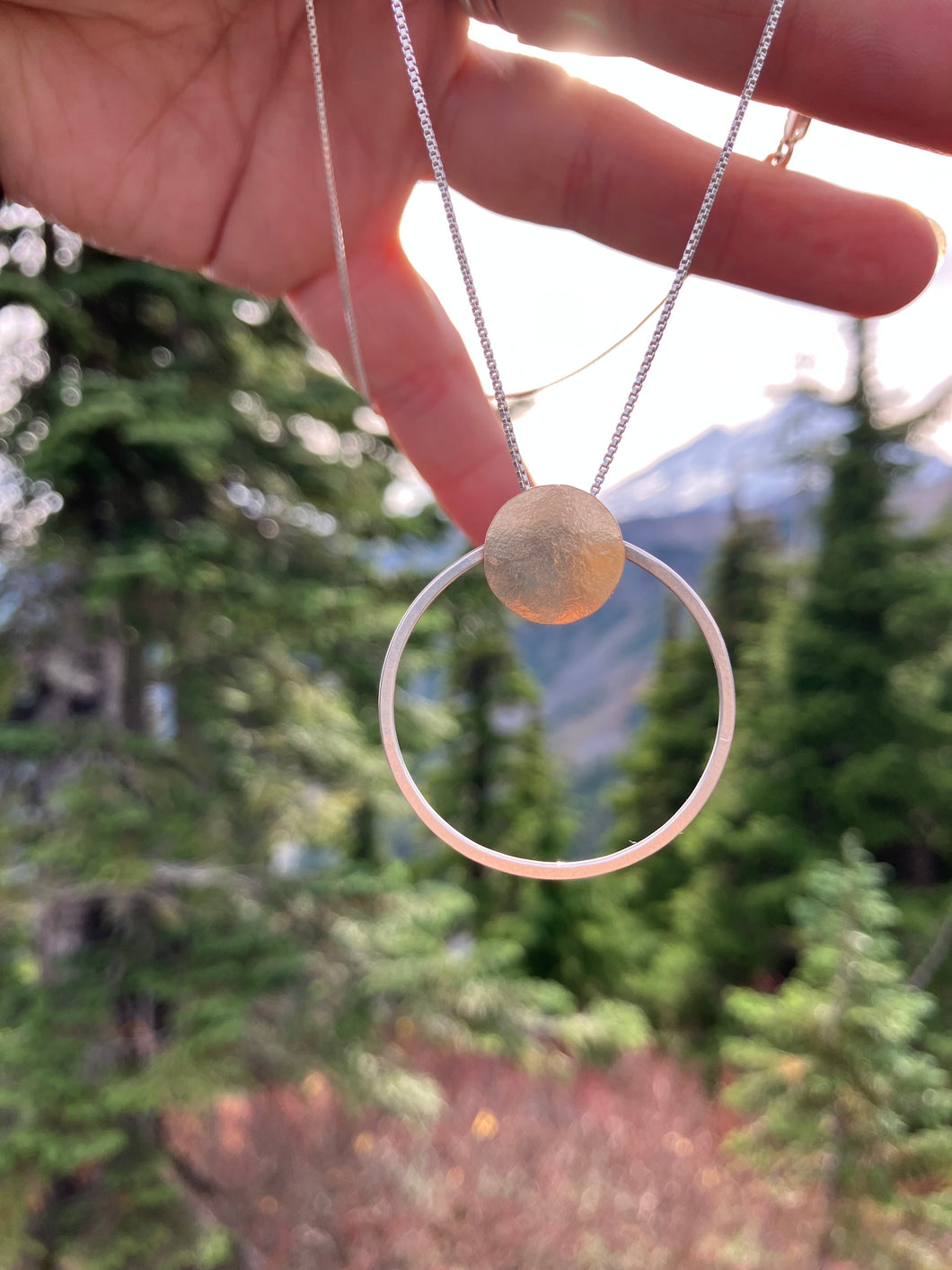 Sun and earth necklace